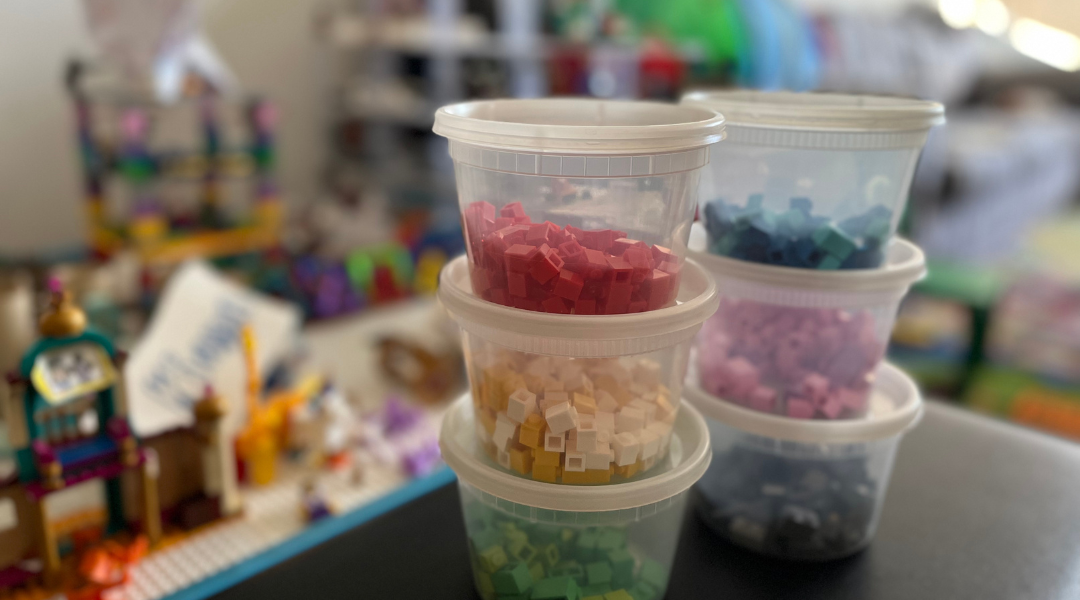 repurposing takeout containers as rainbow colored Lego storage 