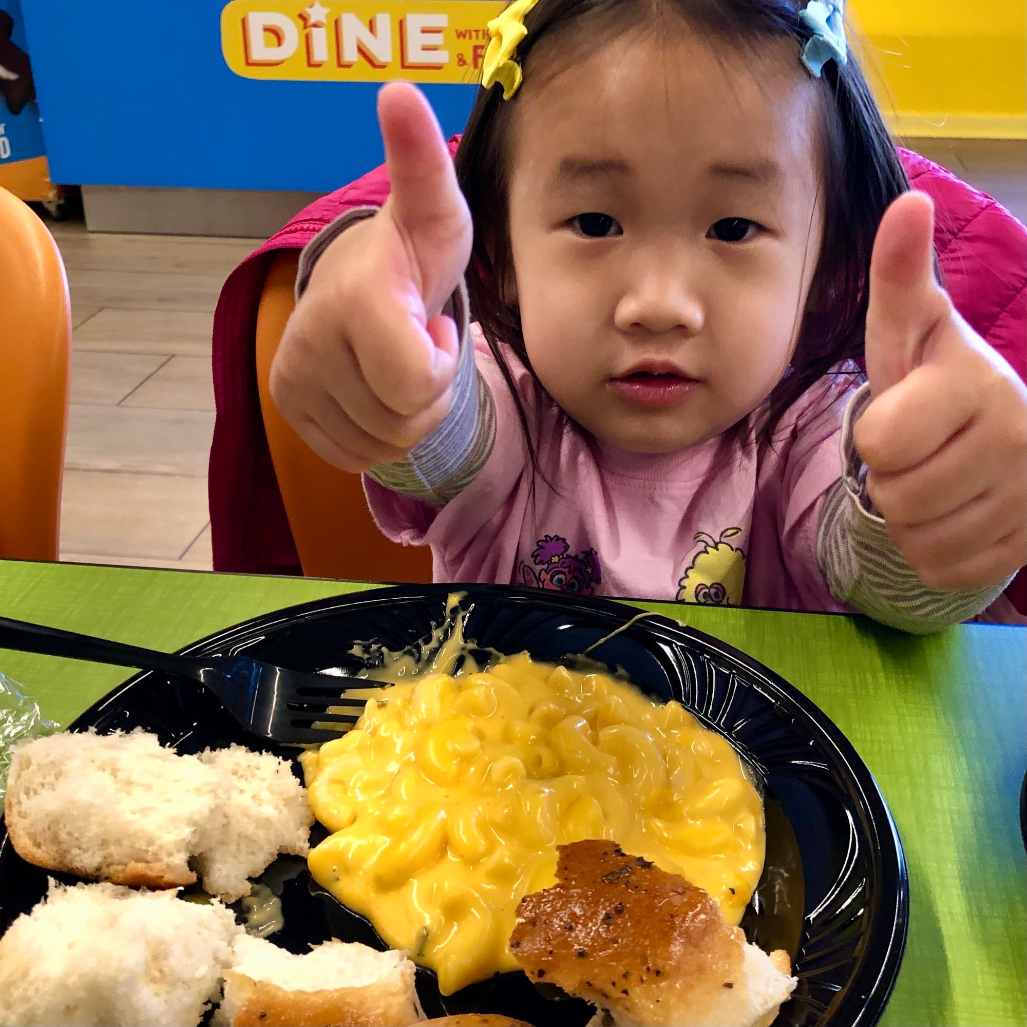 Toddler Approved Mac & Cheese and Dinner Rolls at Dine with Elmo